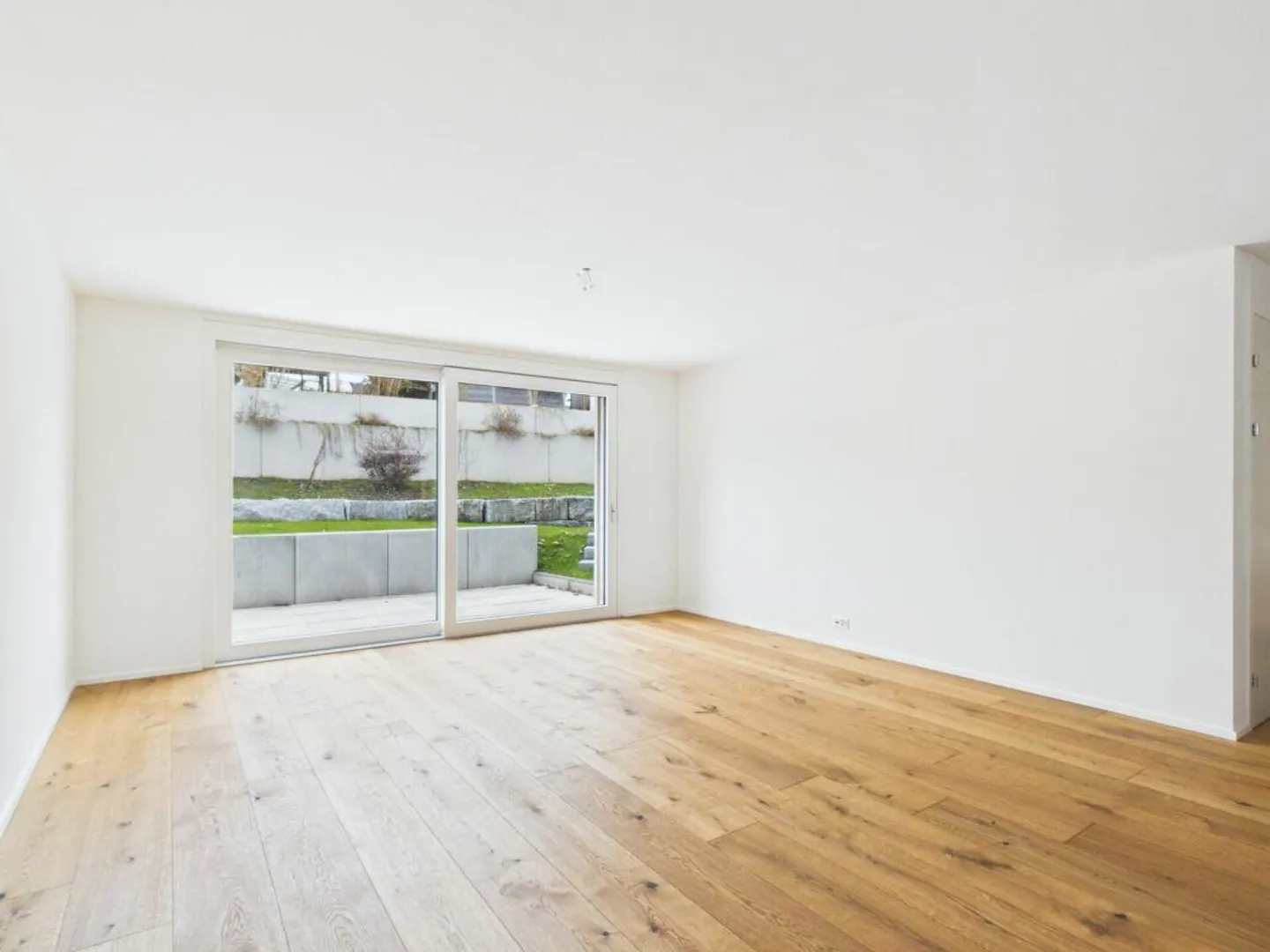 Stilvolle Neubauwohnung mit Garten - Foto 3 von 10