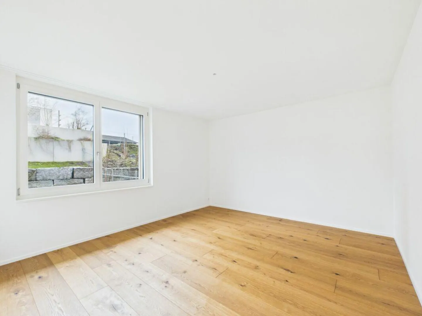 Stilvolle Neubauwohnung mit Garten - Foto 7 von 10