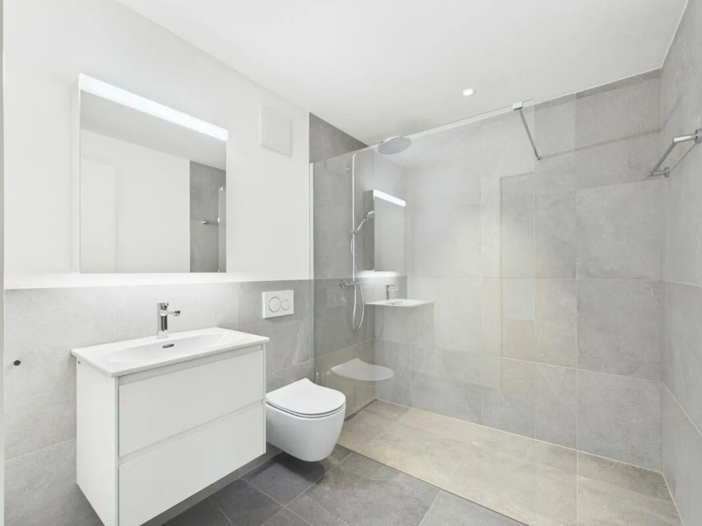 Stilvolle Neubauwohnung mit Garten - Foto 9 von 10