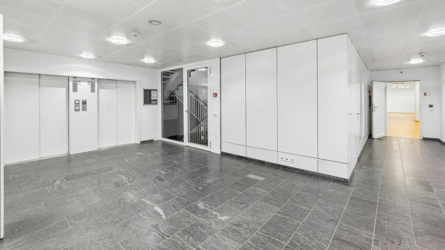 Versatile Commercial Space on the Ground Floor - Photo 10 of 16