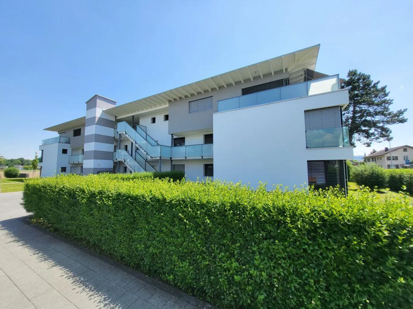 Einzigartige 5.5-Zimmer-Attika-Wohnung mit Blick ins Grüne Kopie - Foto 1 von 11