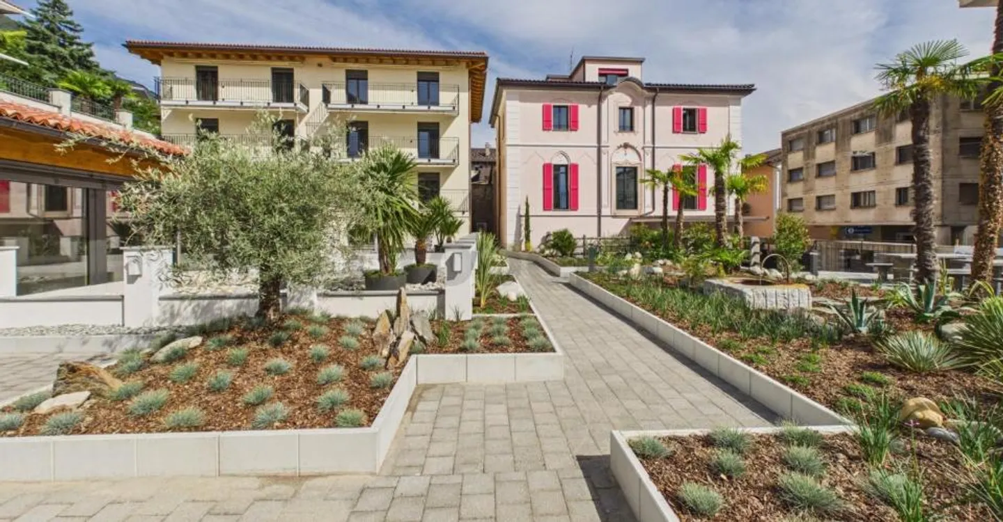 Bright Spaces, High-Quality Finishes, Sustainable Construction & Well-Served Neighborhood! - Photo 1 of 9