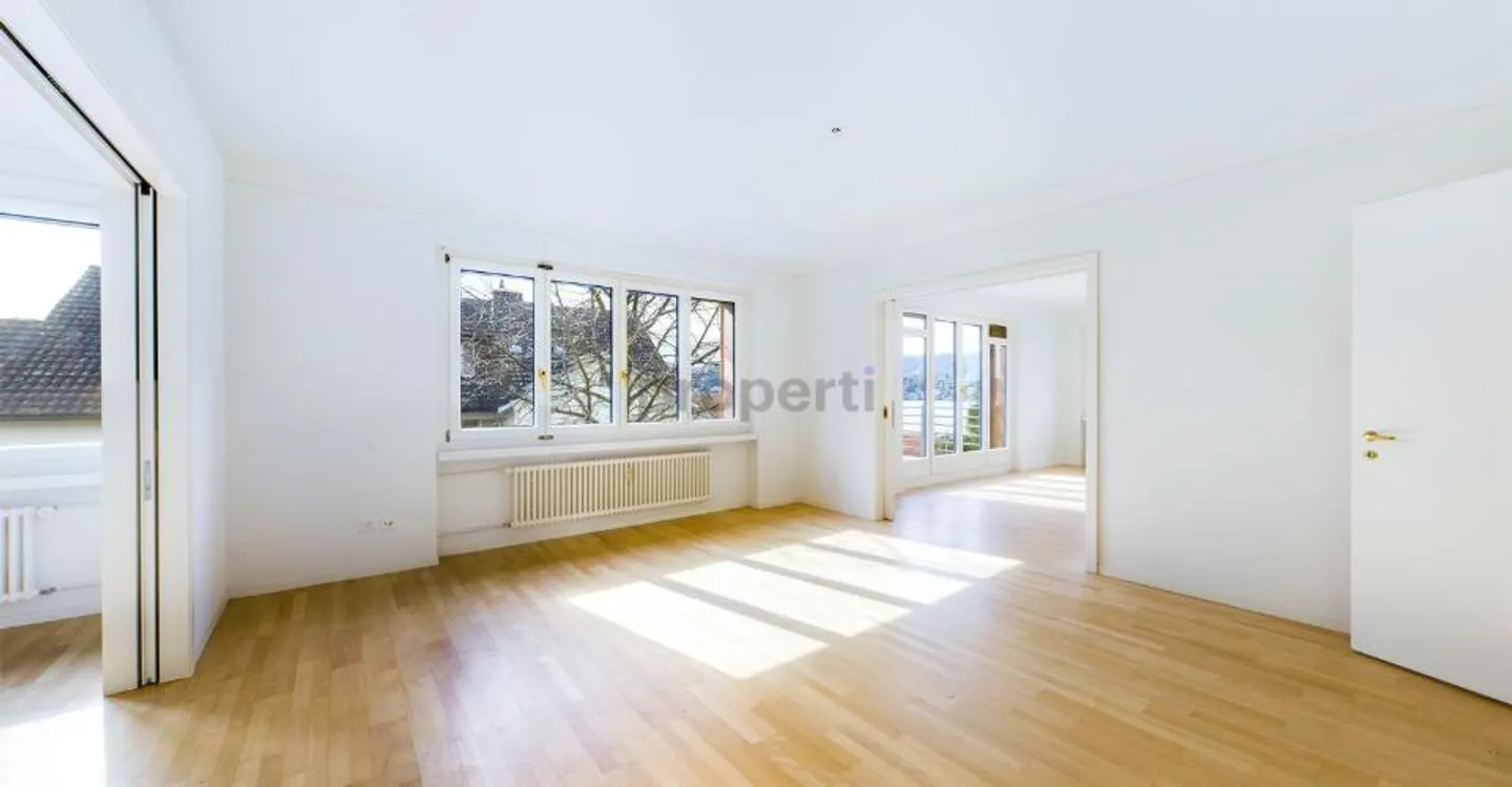 Charmante Wohnung mit Seesicht - Foto 1 von 12