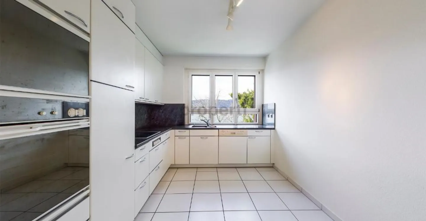Charmante Wohnung mit Seesicht - Foto 2 von 12