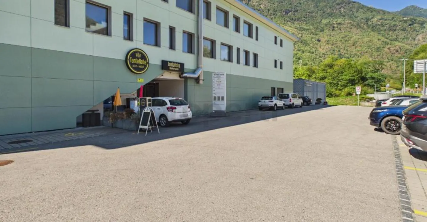 Exclusive Opportunity in the Heart of Maggia: Large Terrace, State-of-the-Art Kitchen & Included Studio! - Photo 7 of 11