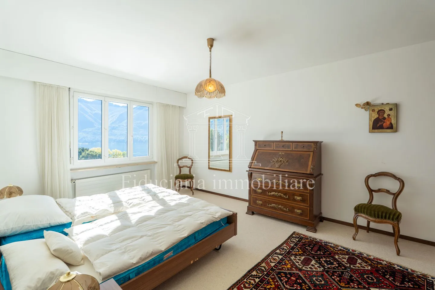 MURALTO - Appartement 2.5 pièces avec vue imprenable sur le lac et terrasse couverte - Photo 5 sur 8