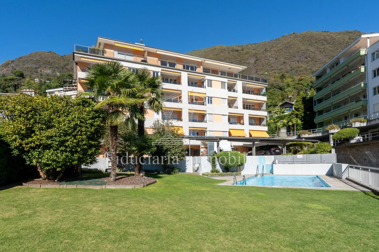 MURALTO - Appartement 2.5 pièces avec vue imprenable sur le lac et terrasse couverte - Photo 8 sur 8