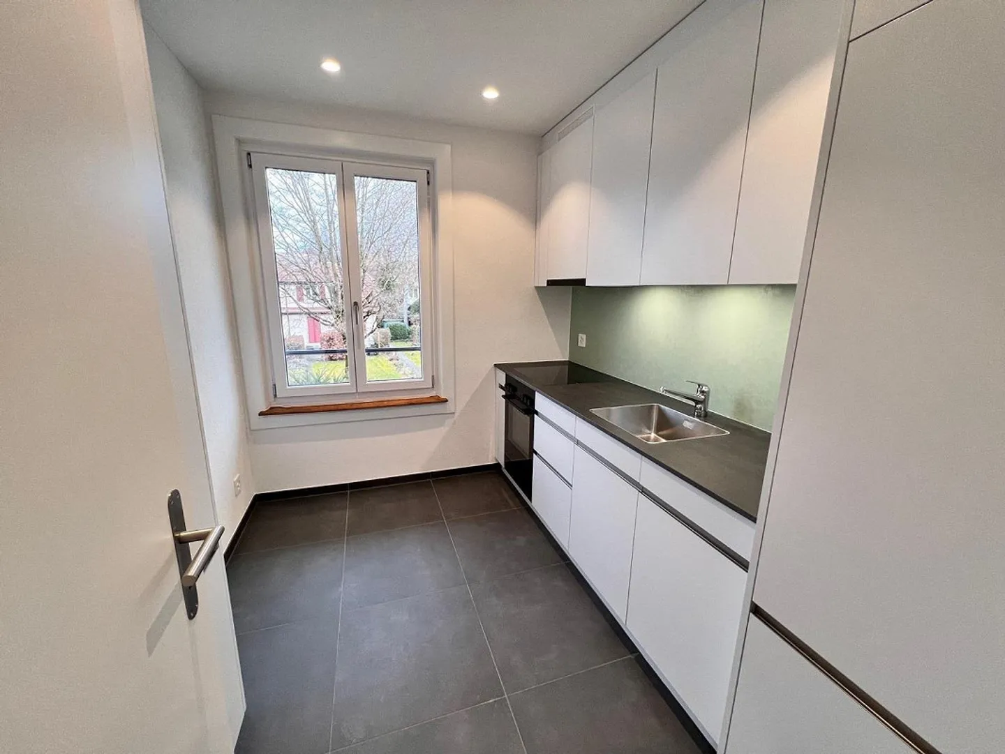 Exclusive 3.5-room apartment in completely renovated multi-family house - Photo 1 of 13