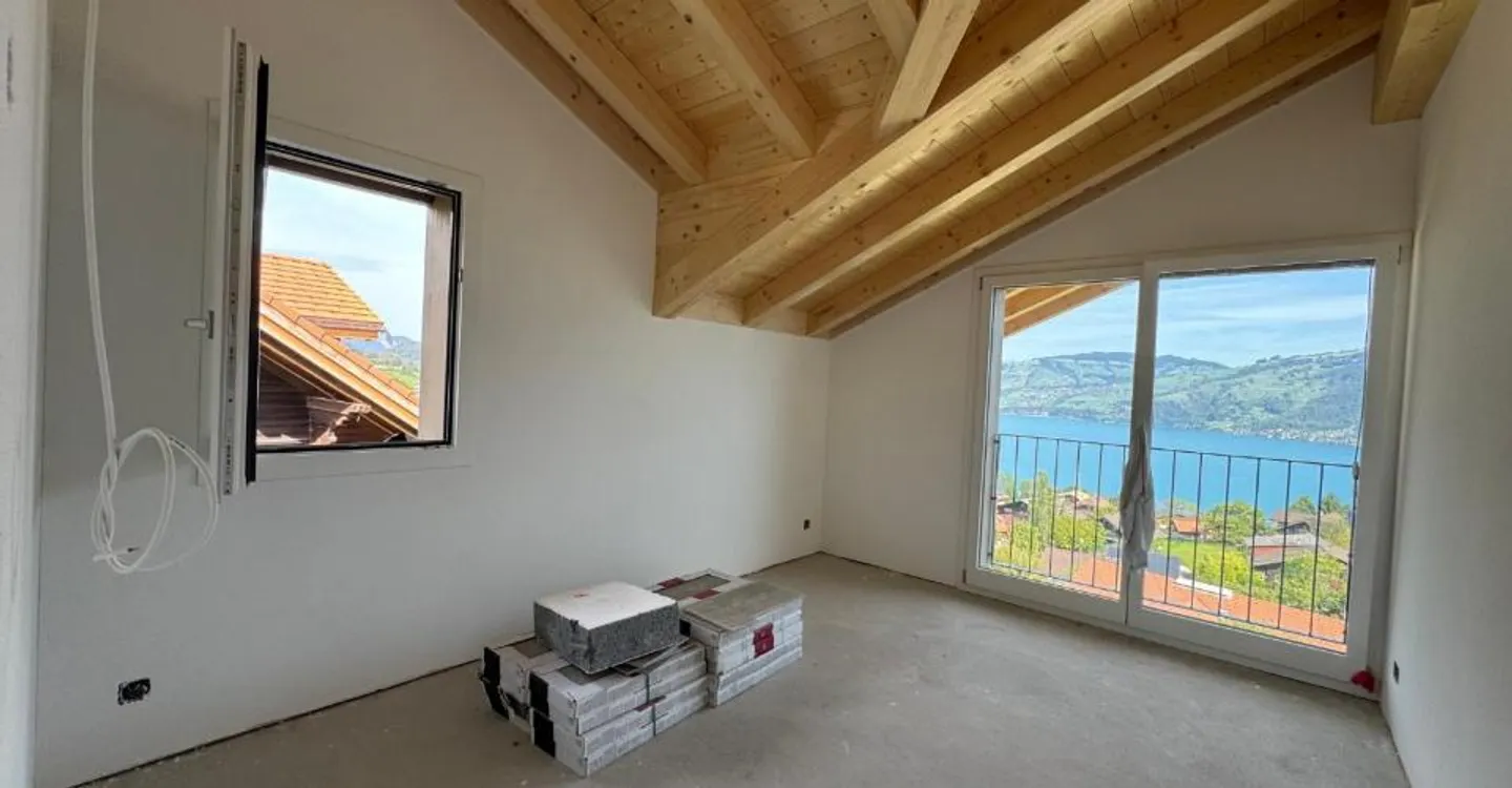 Stunning view of Lake Thun, Spacious balcony with panoramic view, First occupancy in new building with four units - Photo 4 of 6