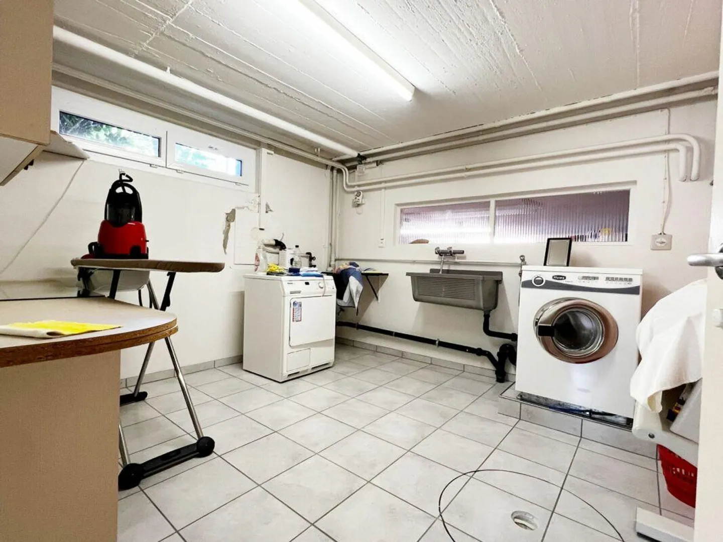 Maison individuelle au caractère unique avec une précieuse réserve de terrain - Photo 29 sur 29