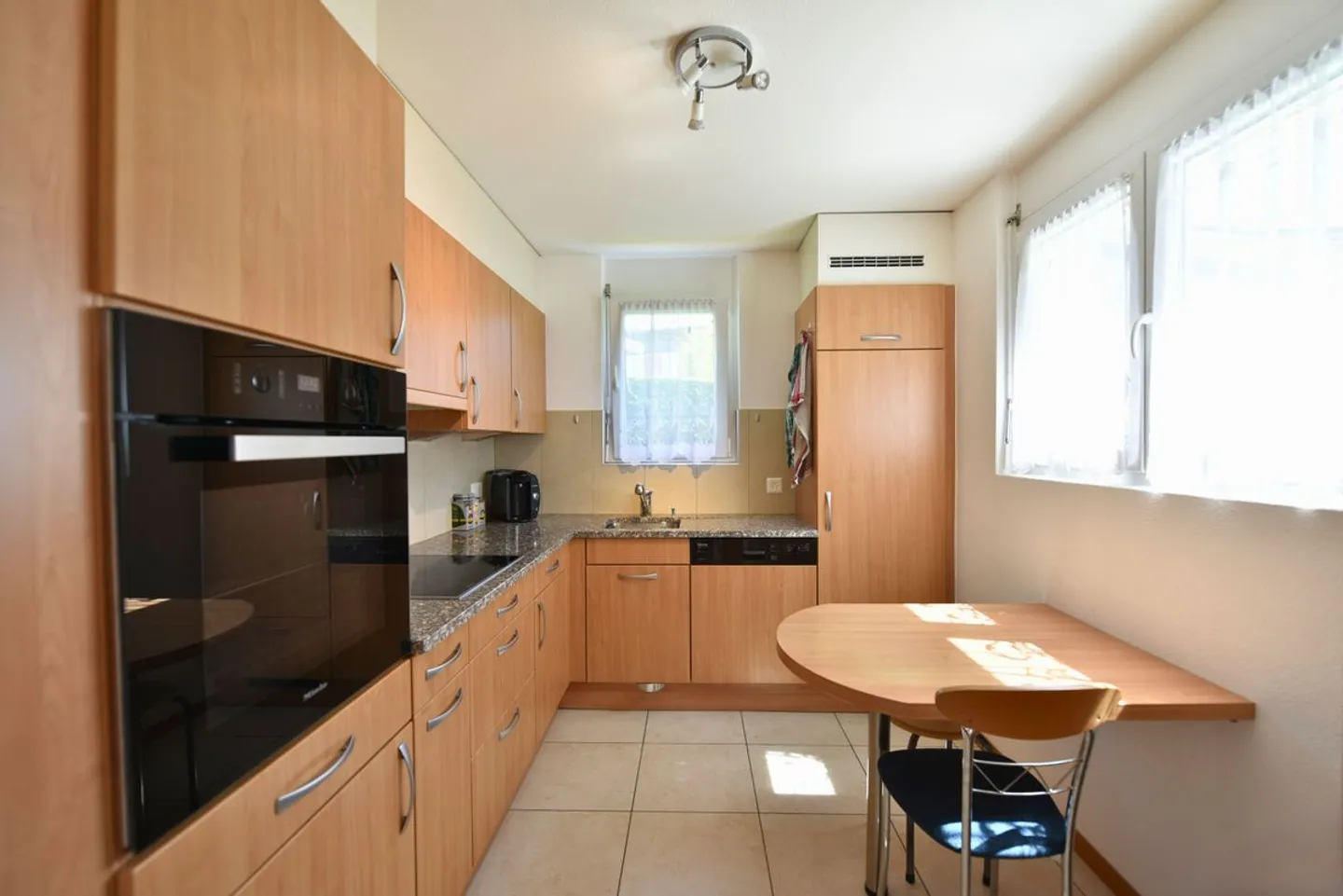 Appartement Charmant à Corcelles - Photo 3 sur 9