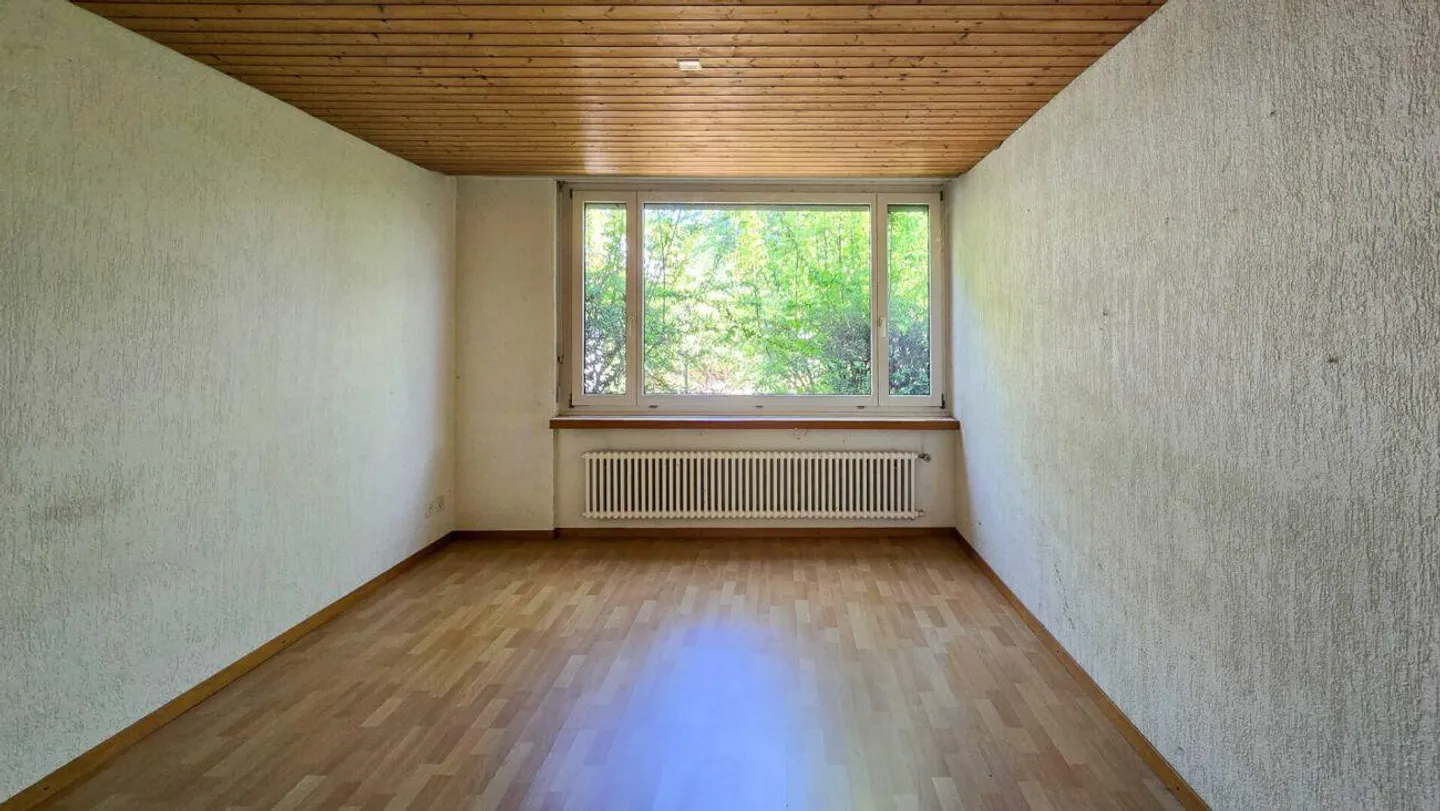 Maison individuelle spacieuse avec potentiel de développement - Photo 7 sur 12