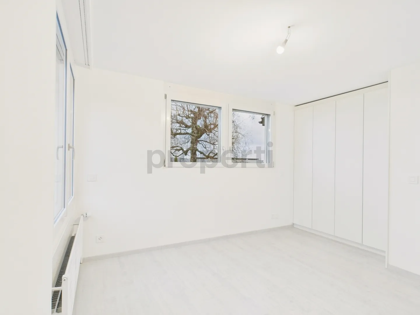 Moderne 6,5-Zimmer Reihenhaus mit Garten in La Neuveville - Foto 5 von 13