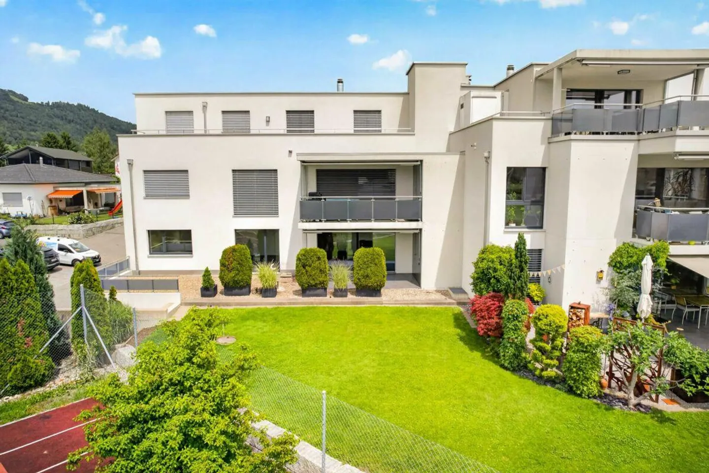 Sogno Familiare con Giardino: Moderno Appartamento di 4.5 Stanze - Foto 1 di 13