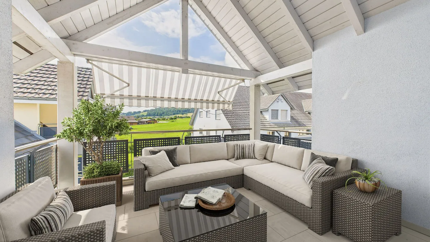 Attico con area living aperta e vista sul verde - Foto 1 di 8