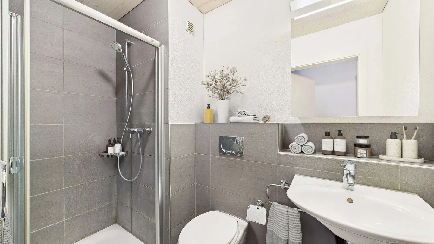 Attico con area living aperta e vista sul verde - Foto 7 di 8