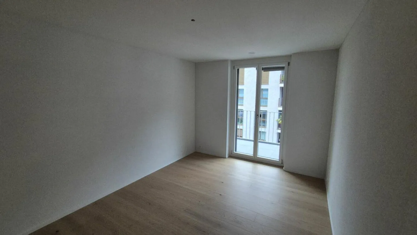 Stylische Neubauwohnung in zentraler Lage - Foto 5 von 7