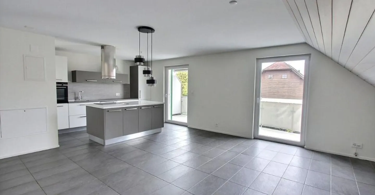 Spacieux appartement de 5,5 pièces en duplex - Photo 2 sur 7