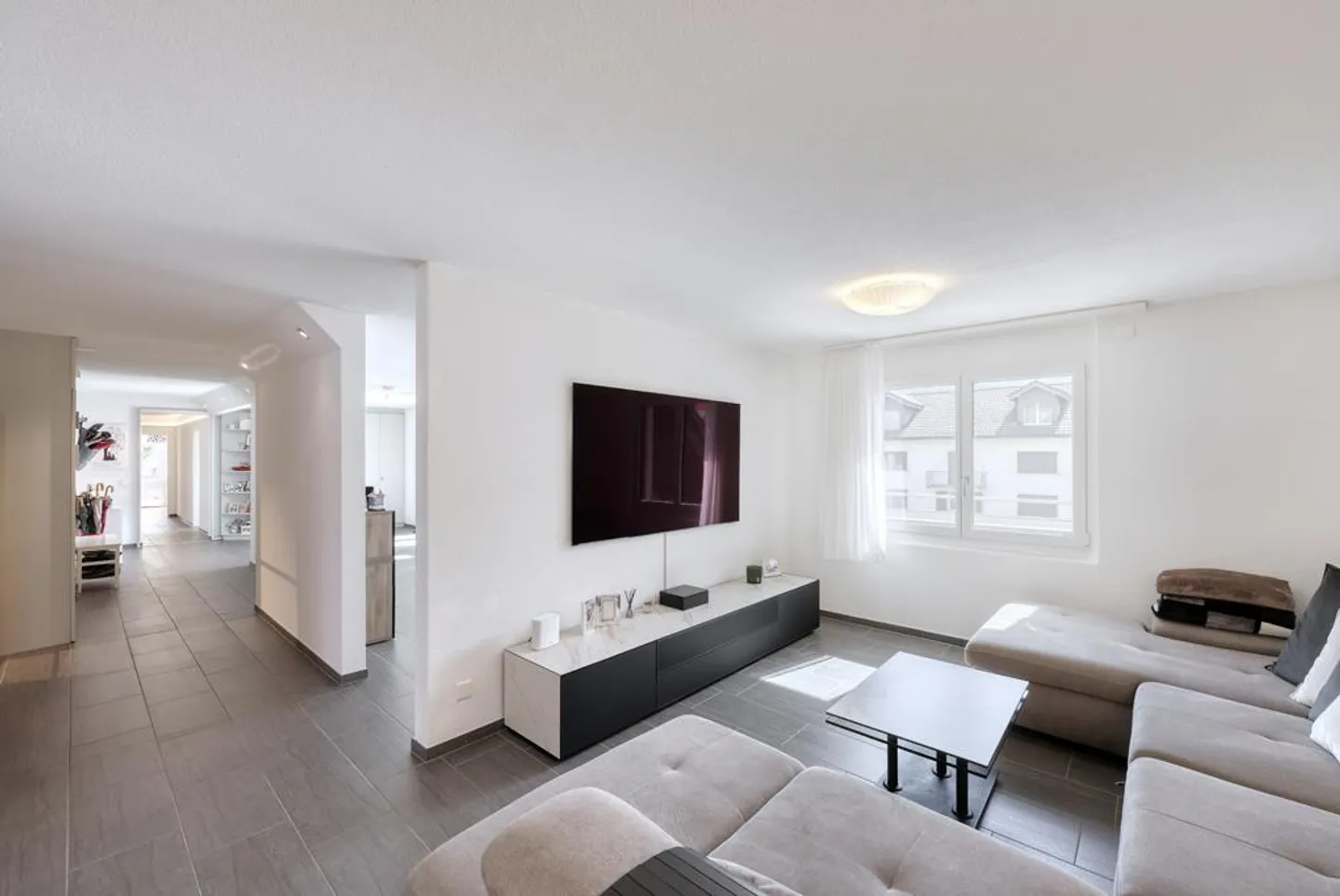 Central Location Meets Space Wonder: Stylish Living in the Village Center - Photo 4 of 10