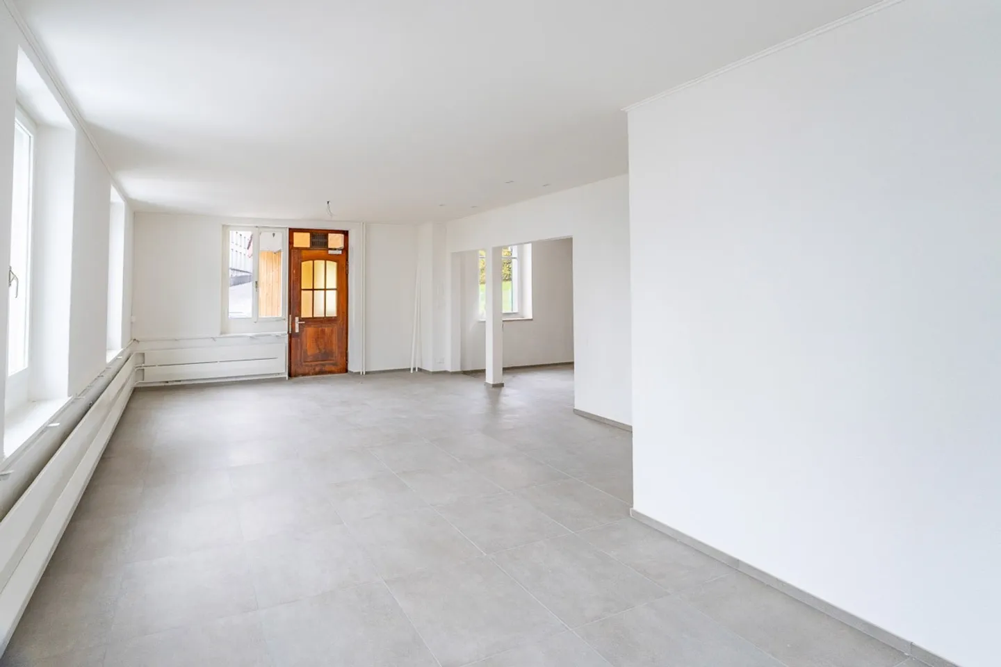 Maison multifamiliale avec espace commercial - directement à la gare de Rorschach Stadt - Photo 3 sur 10