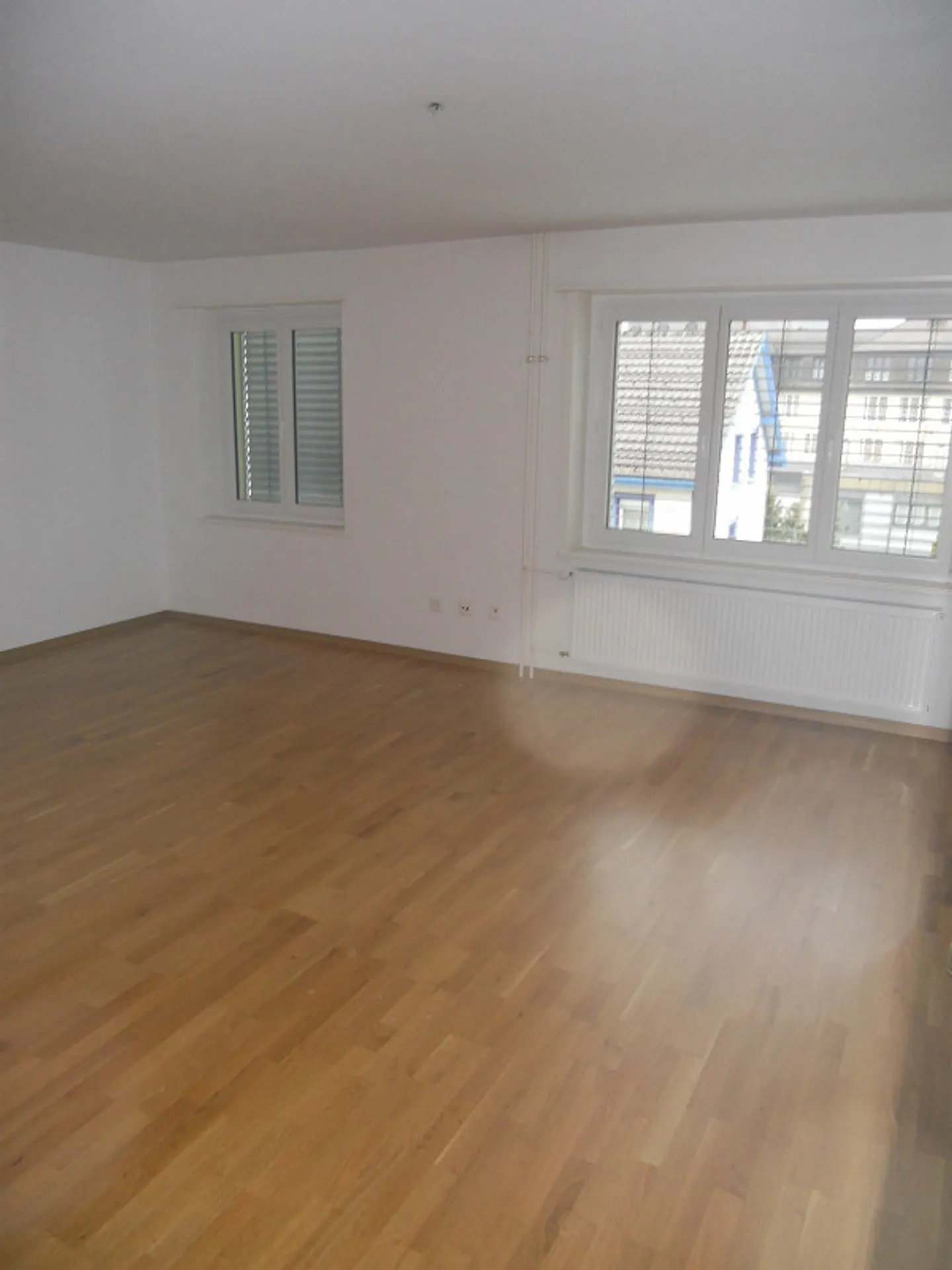 Geräumige Wohnung mit Balkon - Foto 5 von 5