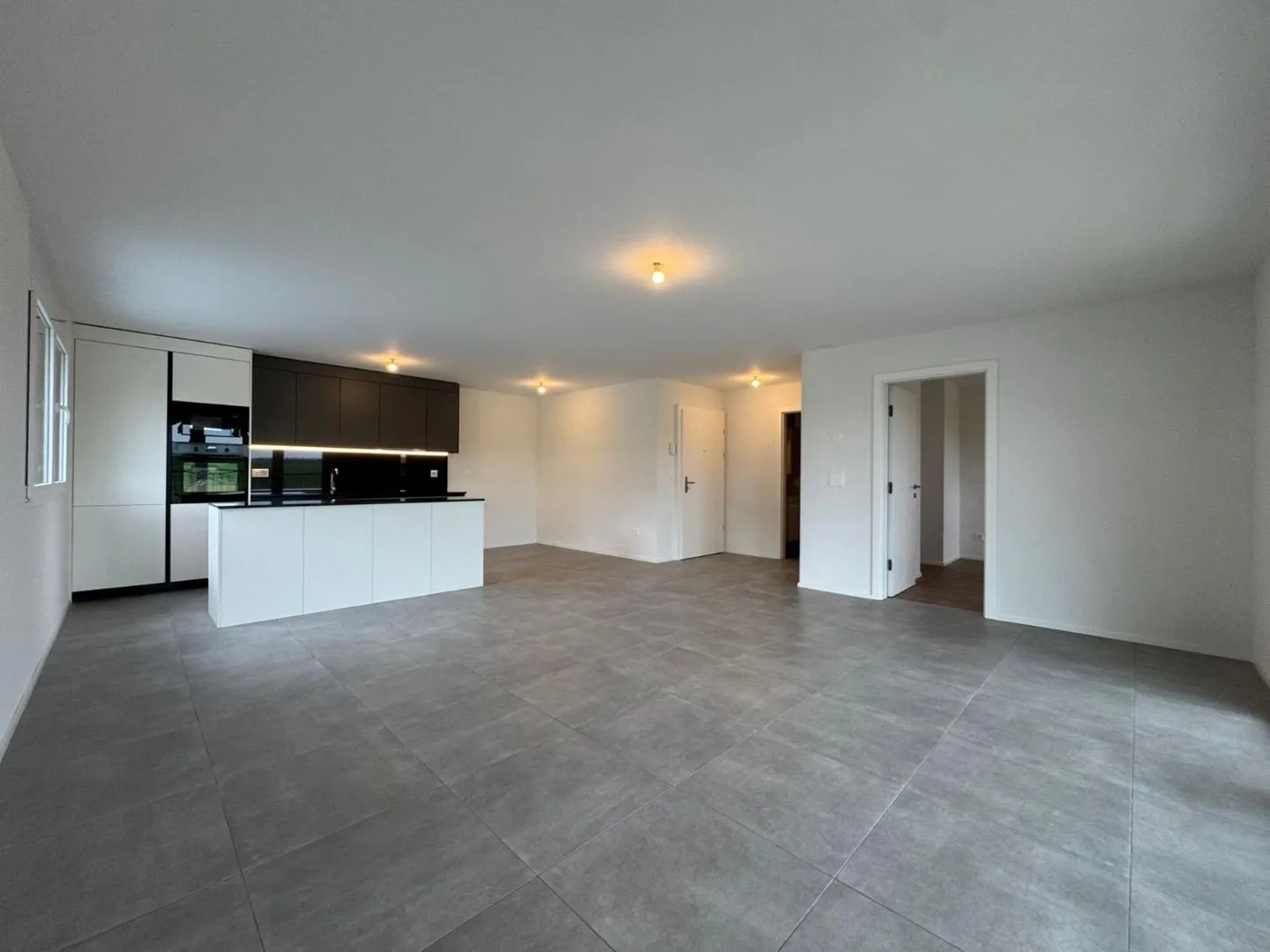 Modernes Erdgeschoss-Apartment - Foto 2 von 9