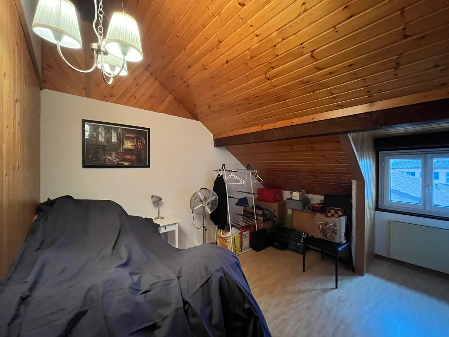 Appartement de quatre pièces dans les combles - Photo 8 sur 9