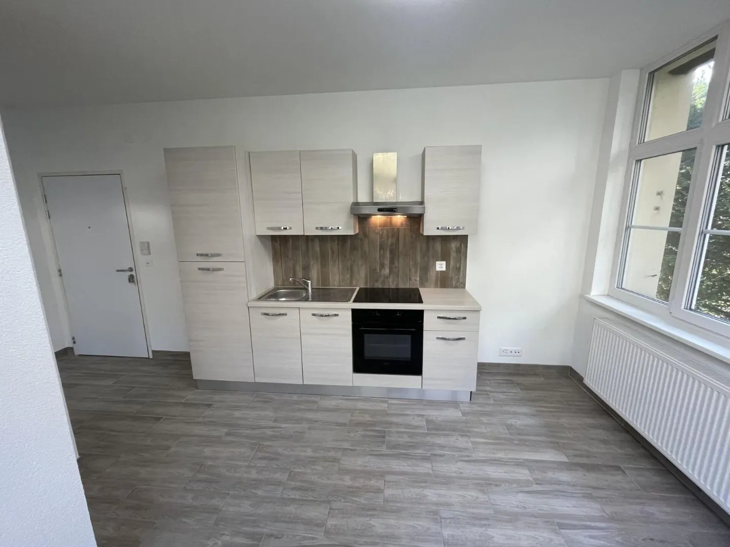 St-Imier, studio completamente ristrutturato al 1° piano - Foto 1 di 3