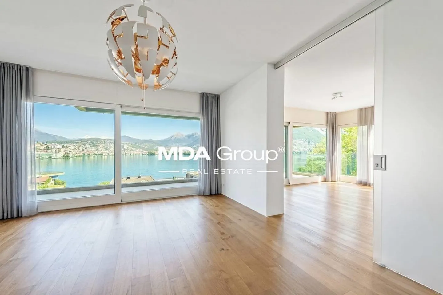Design-Appartement mit Seeblick - Foto 3 von 13