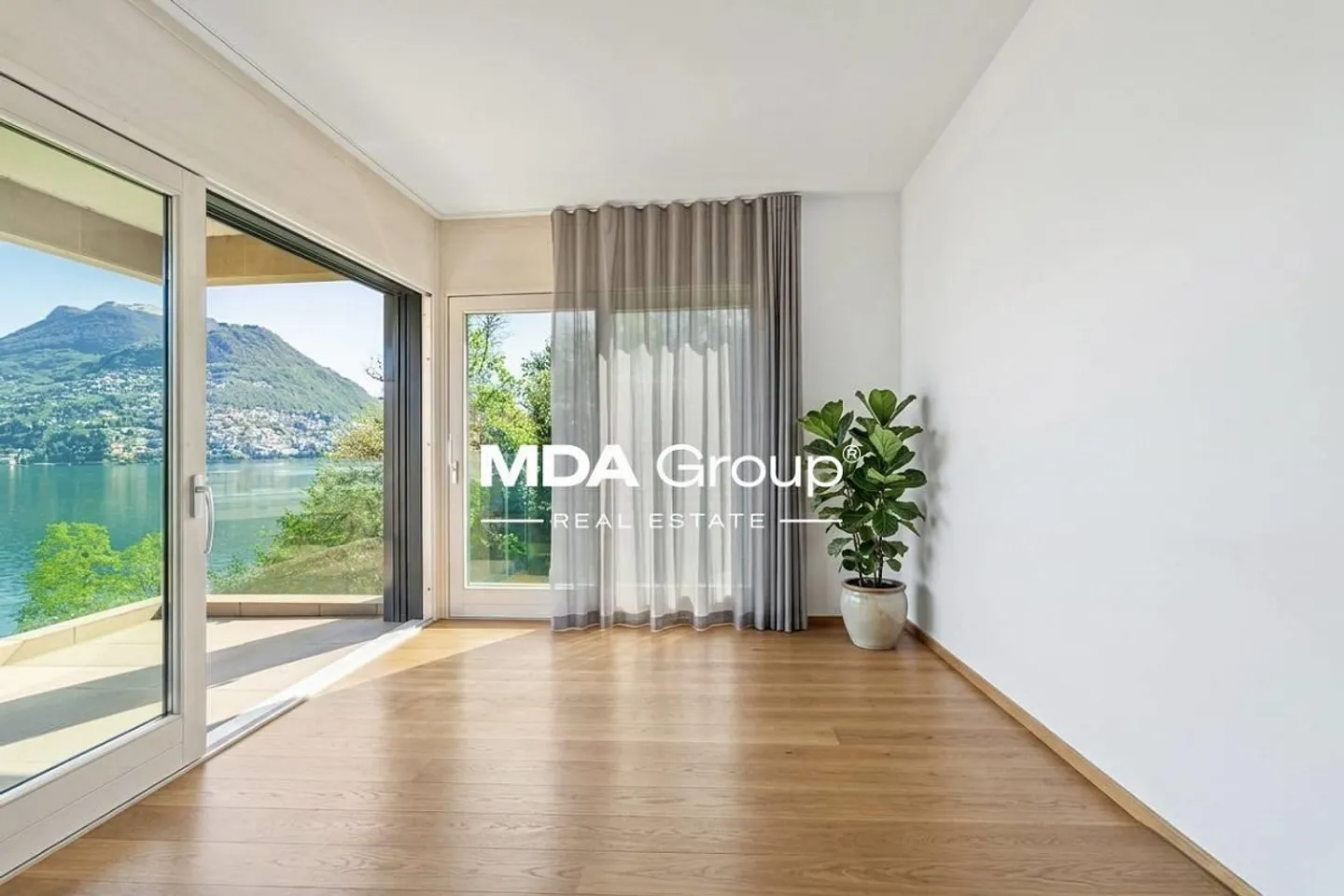 Design-Appartement mit Seeblick - Foto 10 von 13