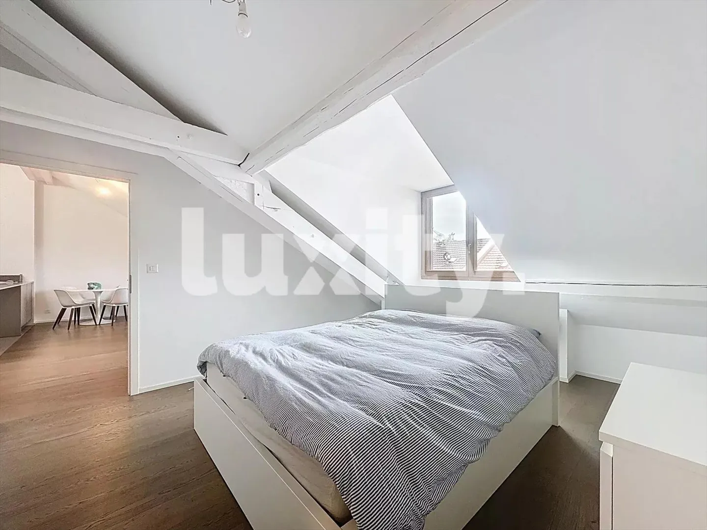 Renovated Attic Apartment with Modern Comfort - Photo 2 of 3