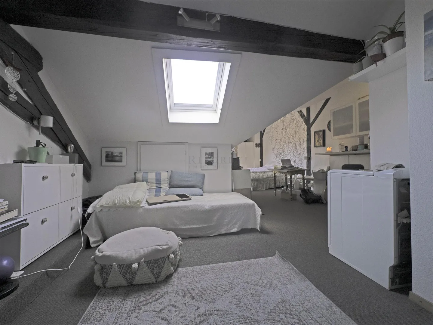 In the heart of Old Carouge, a 67-square-meter PPE condominium apartment under the roofs ! - Photo 1 of 4