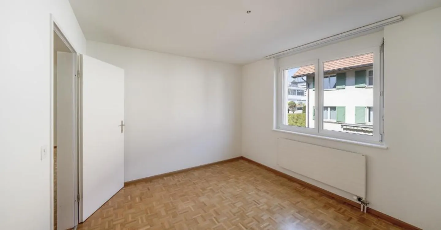 Cozy 3.5 Room Apartment with Garden Seating Area! - Photo 1 of 8