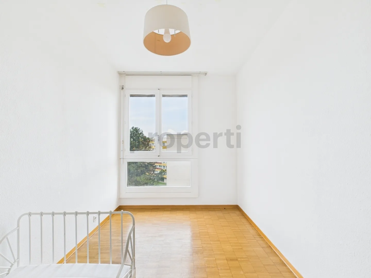 Geräumige Wohnung mit 4 Schlafzimmern in Meyrin mit Panoramablick in der 7. Etage - Foto 6 von 12