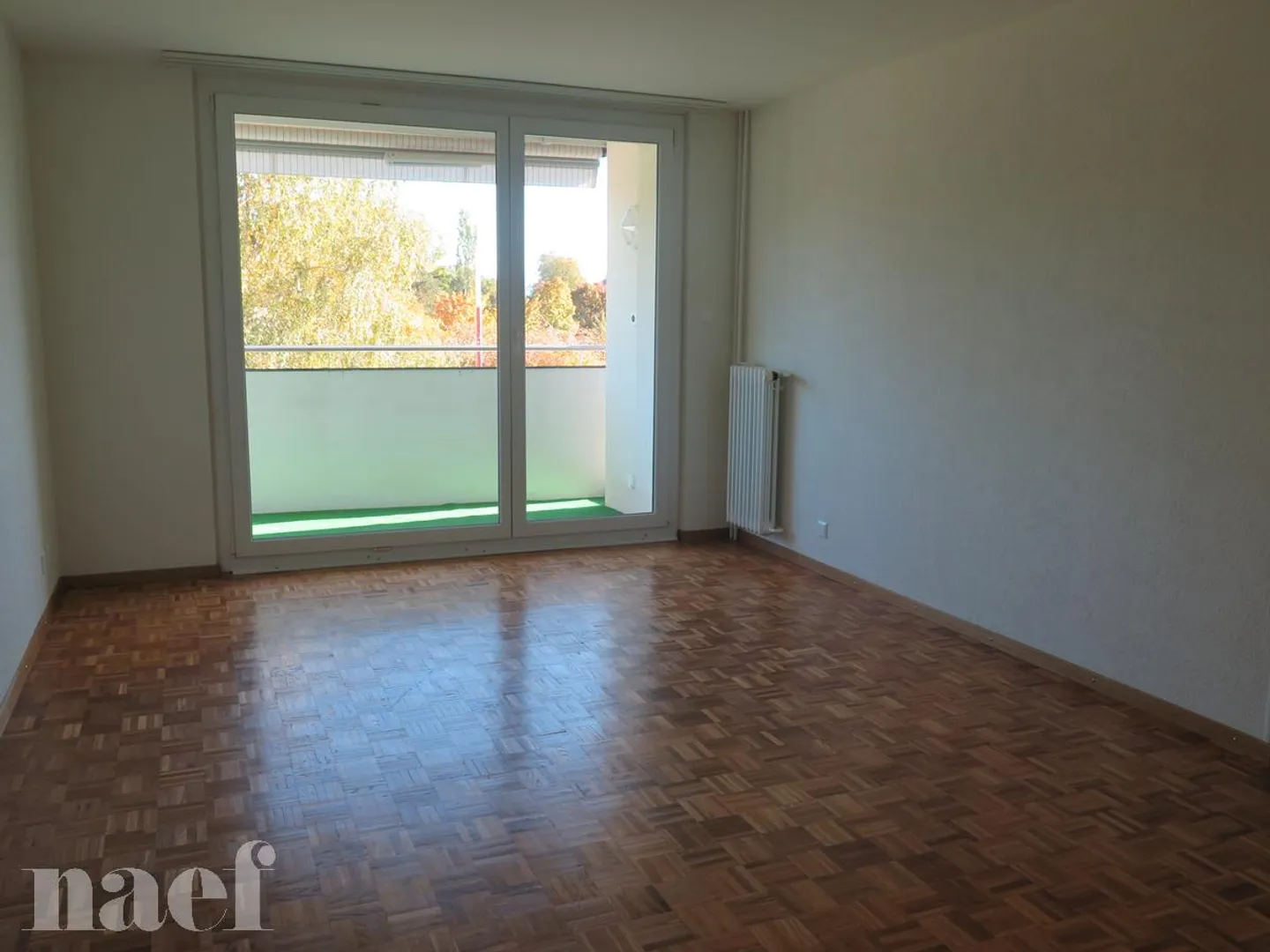 Très bel appartement situé dans un quartier calme et verdoyant - Photo 3 sur 5