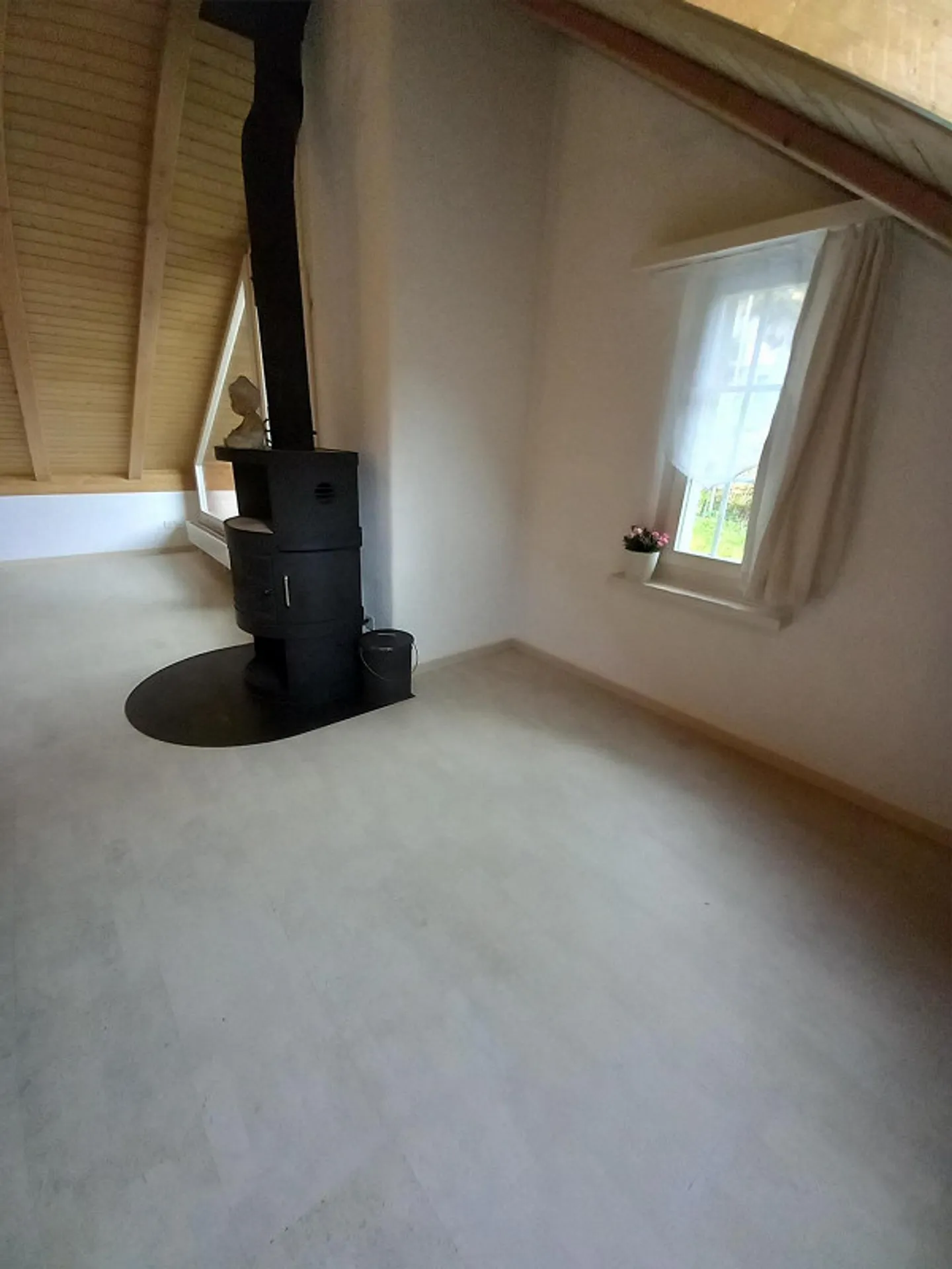 Attractive attic apartment in the village center - Photo 2 of 14