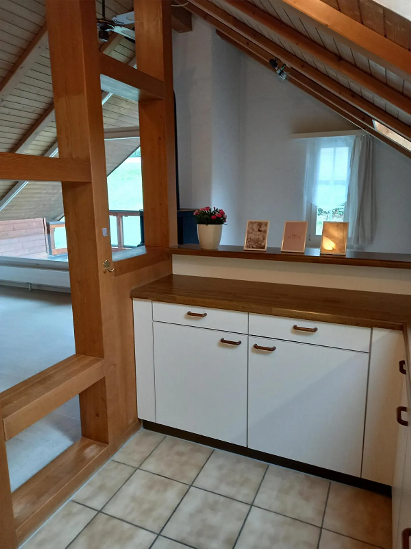 Attractive attic apartment in the village center - Photo 5 of 14