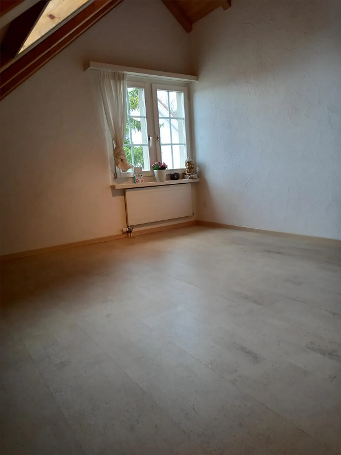Attractive attic apartment in the village center - Photo 9 of 14