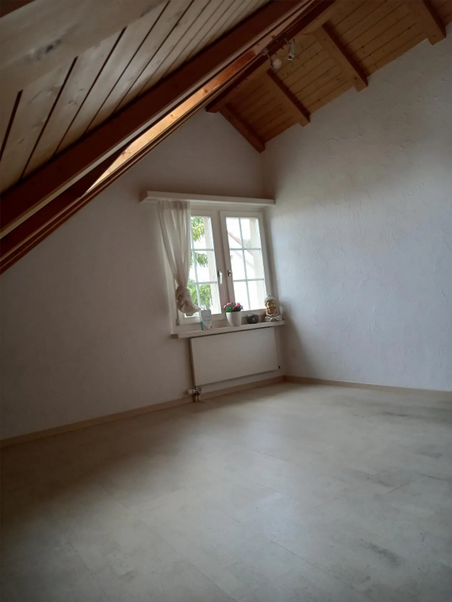 Attractive attic apartment in the village center - Photo 8 of 14