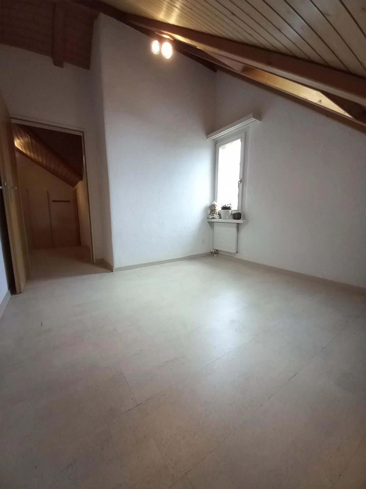 Attractive attic apartment in the village center - Photo 11 of 14