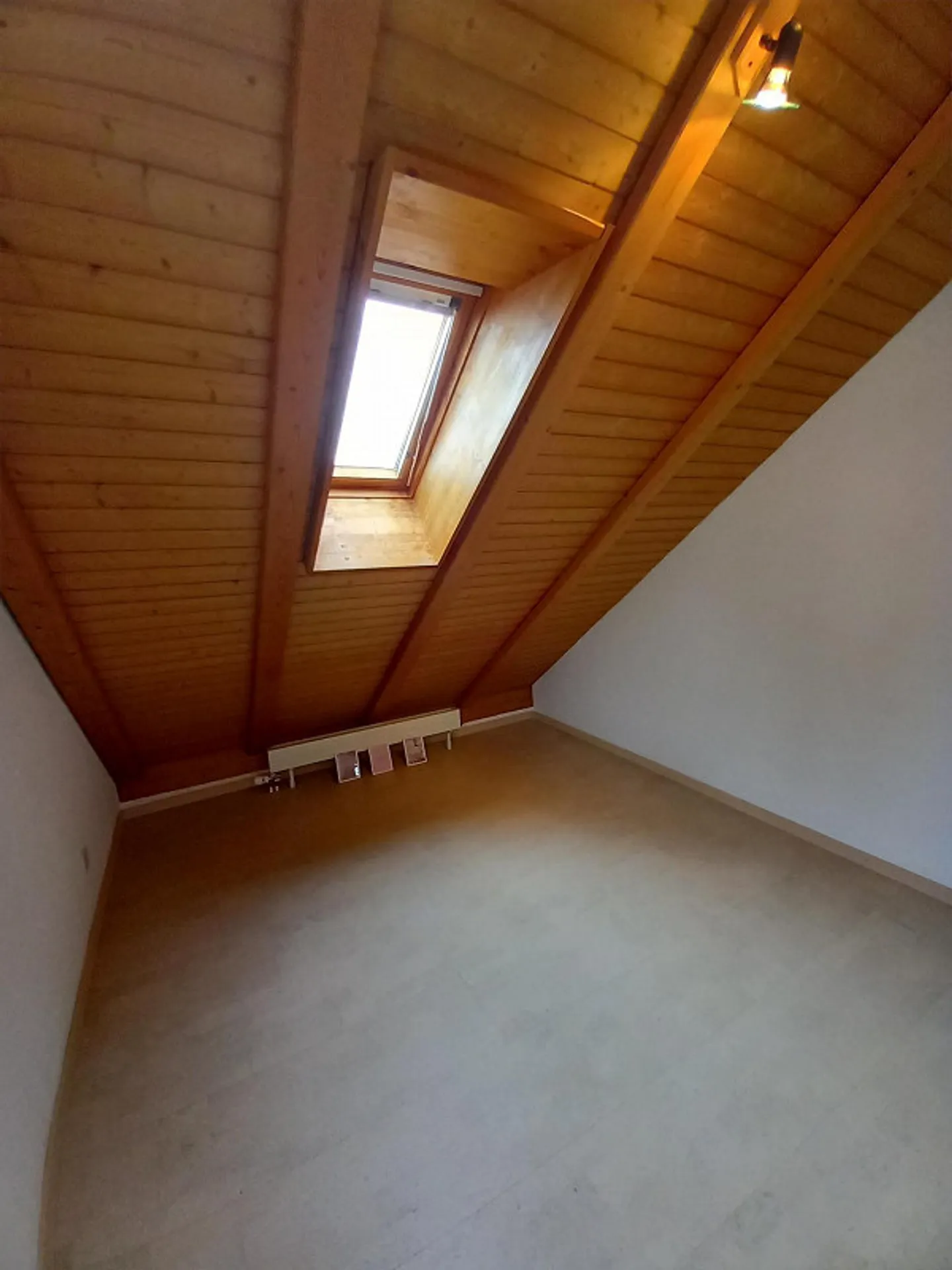 Attractive attic apartment in the village center - Photo 12 of 14