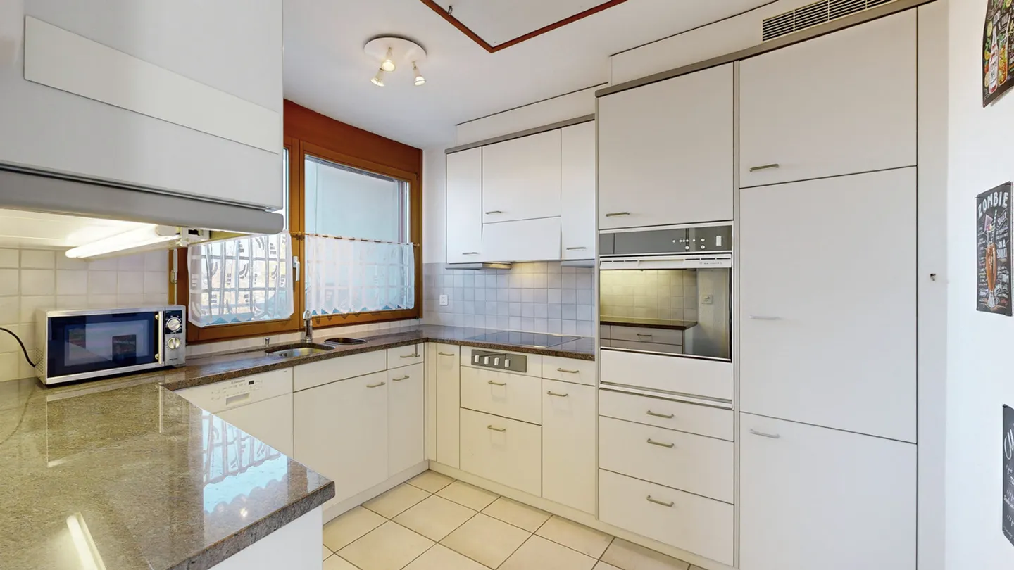 Spacious 3.5-room penthouse apartment with garage - Photo 5 of 15