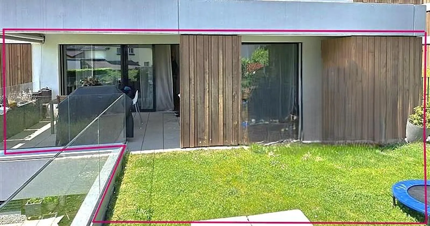 Ampio appartamento giardino di 4½ locali con due posti auto in garage sotterraneo - Foto 1 di 9