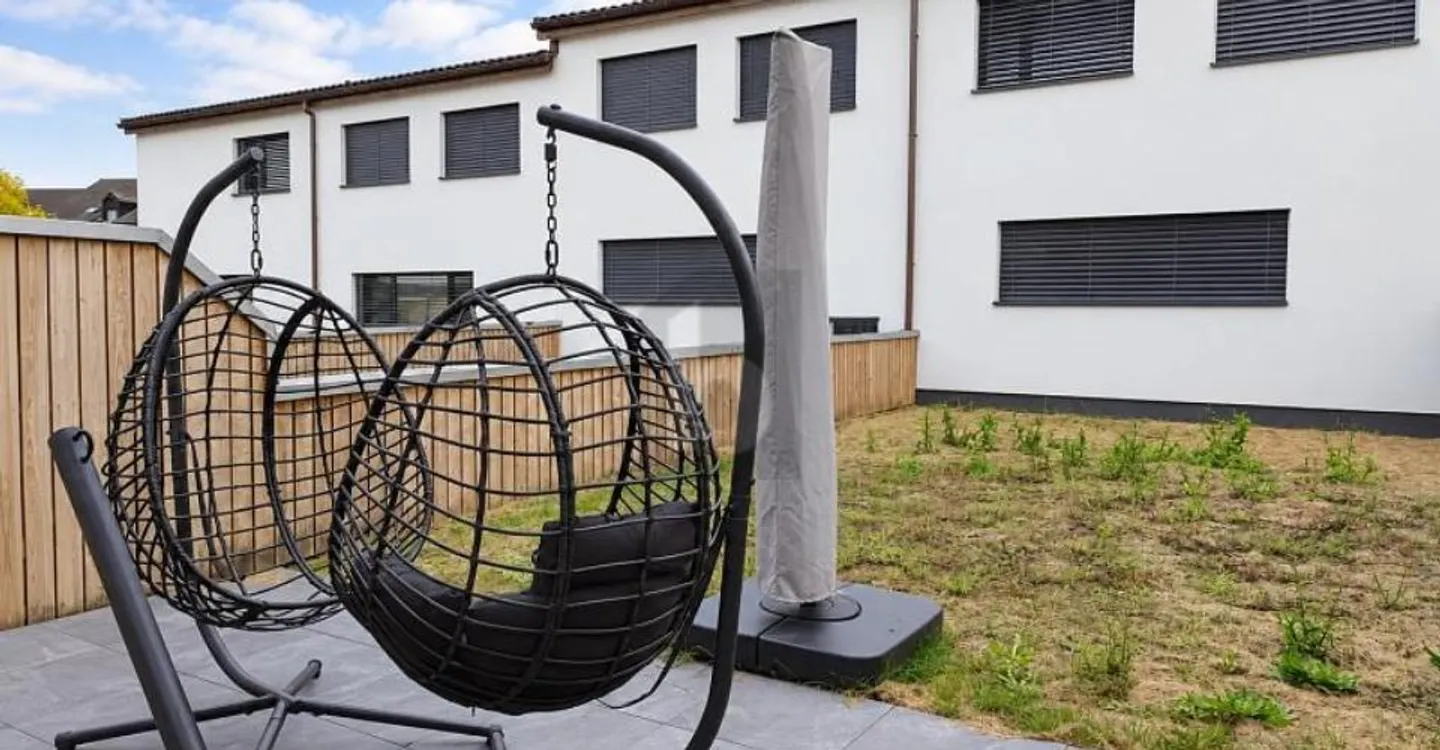 SUR TROIS NIVEAUX AVEC JARDIN PRIVATIF - Photo 1 sur 6