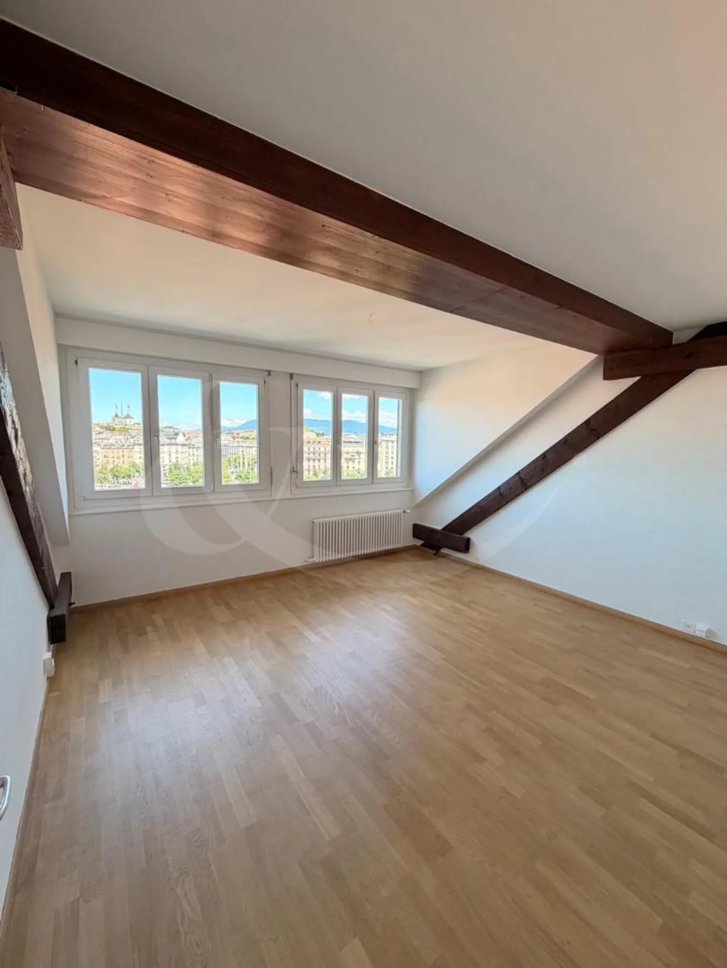 Charmant Appartement Sous Les Toits - Photo 3 sur 10