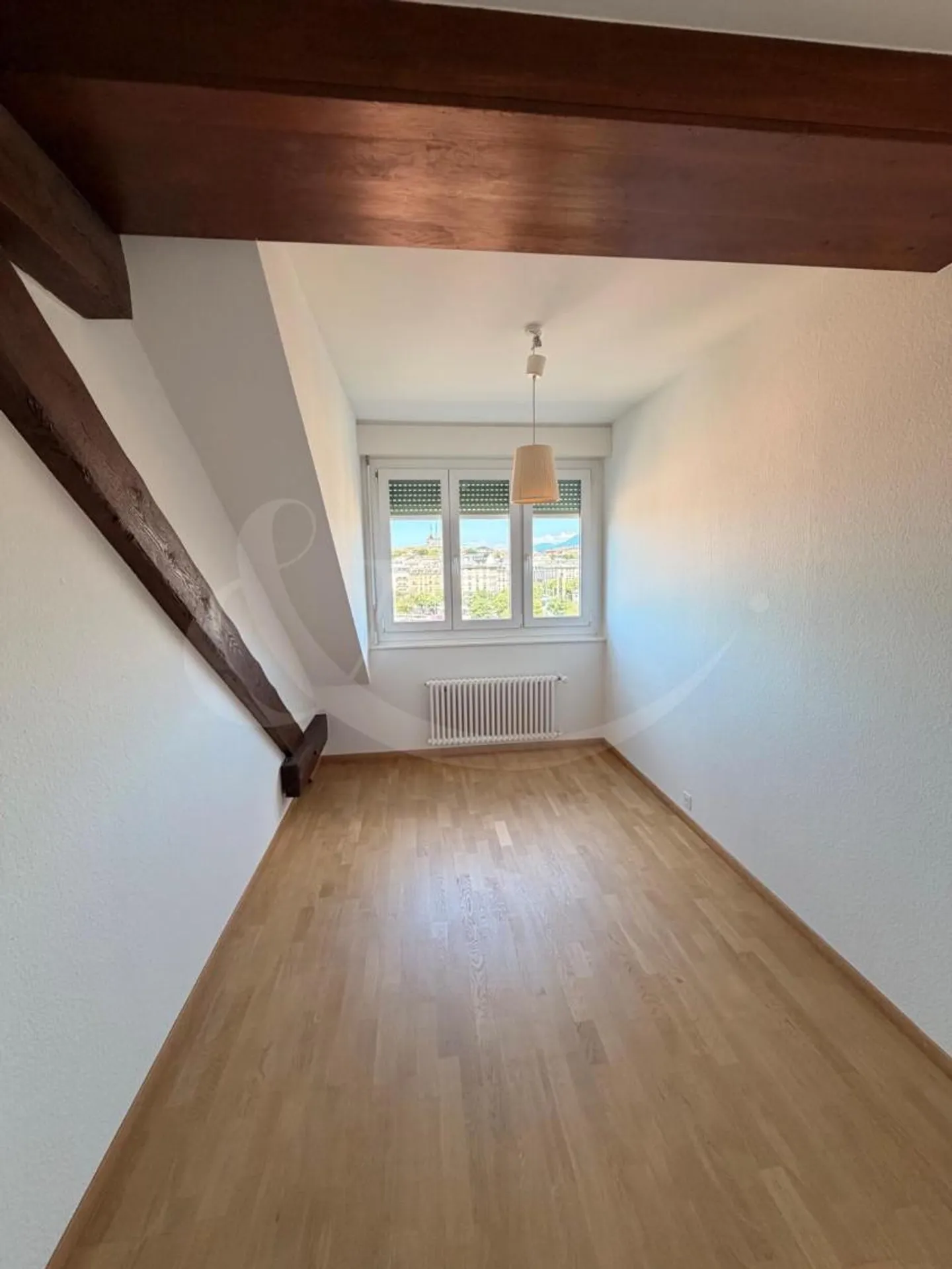 Charmant Appartement Sous Les Toits - Photo 4 sur 10