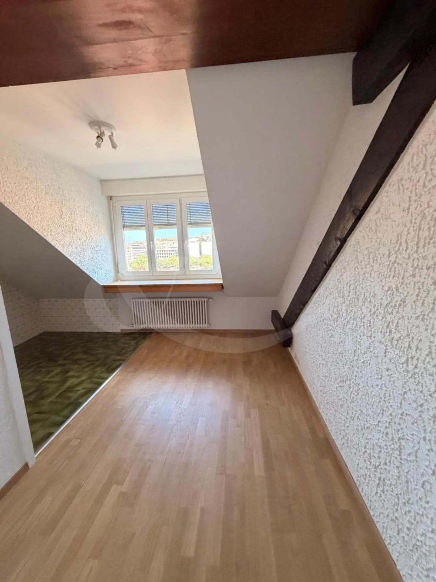 Charmant Appartement Sous Les Toits - Photo 7 sur 10