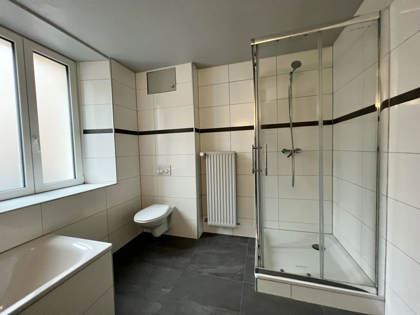 Appartement de 5 pièces rénové avec jardin - Photo 9 sur 12