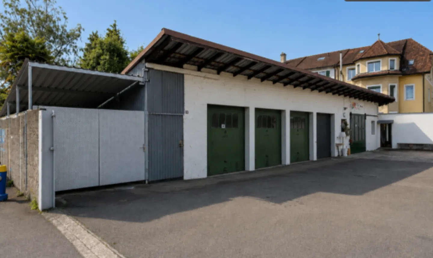 RARE OPPORTUNITY NEAR BASEL - 2 APARTMENTS, GARDEN, STUDIO, 5 GARAGES/PARKING OPTIONS & RENTAL INCOME - Photo 1 of 19