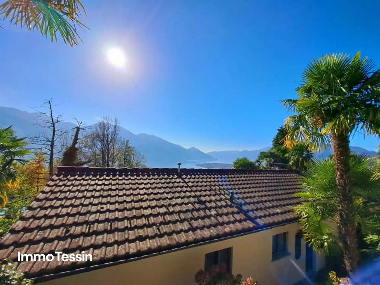OPPORTUNITÀ: Casa con 2 appartamenti in una posizione ambita con vista mozzafiato sul Lago Maggiore - Foto 3 di 13